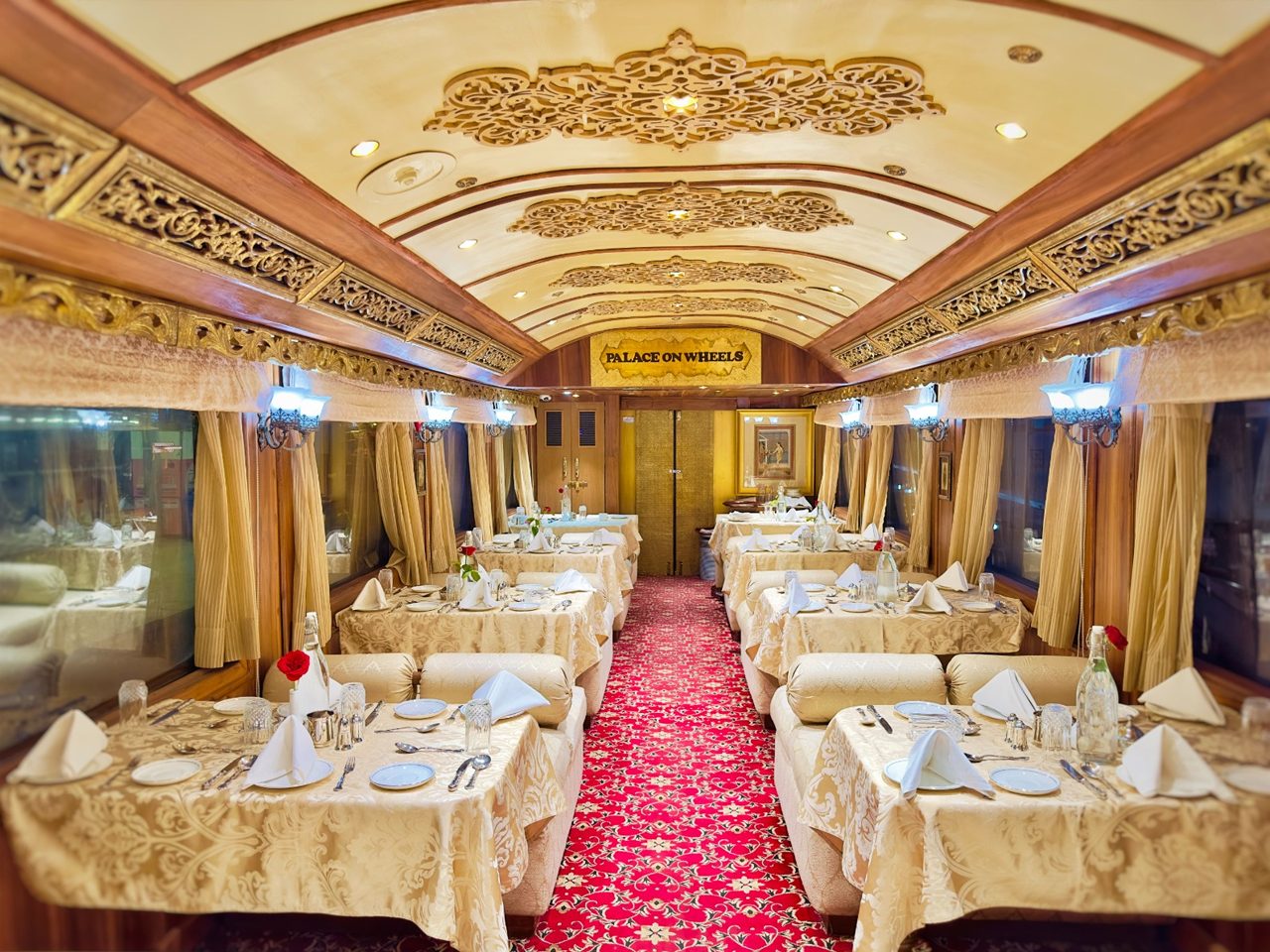 Fine-dining table set aboard the Palace on Wheels restaurant car