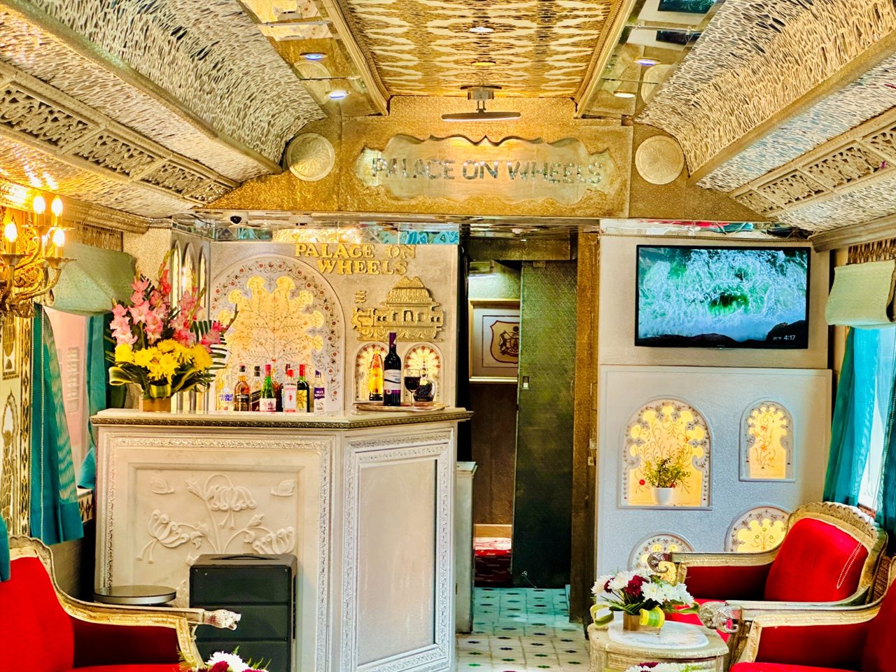 The Palace on Wheels luxury train with red-carpet welcome at a Rajasthan platform